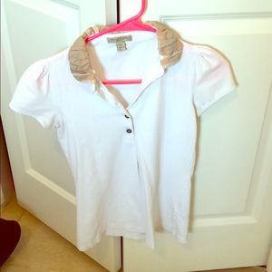 Burberry polo shirt.